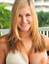 Danielle flashes by the pool