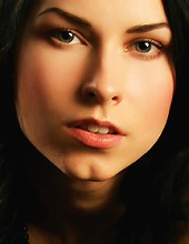 Sultry babe with lustrious black hair and hypnotic eyes.
