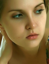 Petite cutie with nubile body and puffy breasts.